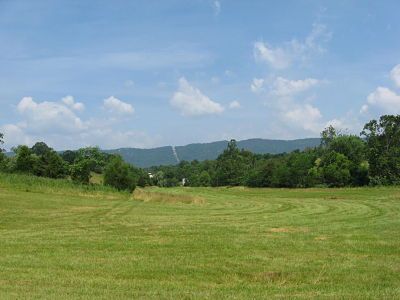 The Confederate position at the Battle of Fisher's Hill — the Confederates formed their line of battle in this open field, perpendicular to the horizon; the 34th Ohio was positioned on the distant ridge